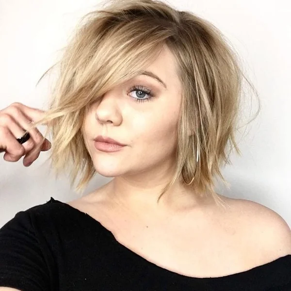 Choppy Blonde Shag Bob with Side Sweep