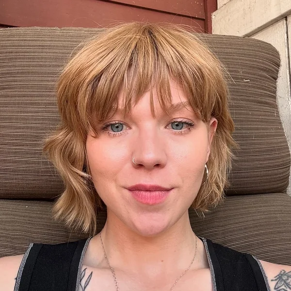 Choppy Golden Shag Bob with Full Fringe