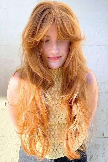 Copper Layers with Wispy Face-Framing Bangs