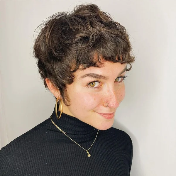 Curly Espresso Pixie with Tousled Texture and Fringe
