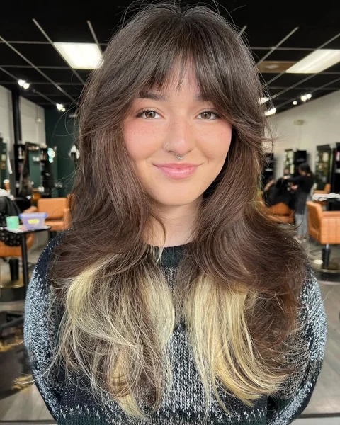 Dimensional Long Shag with Face-Framing Curtain Bangs