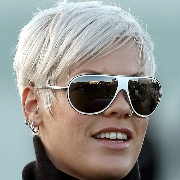 Edgy Platinum Blonde Pixie with Textured Fringe