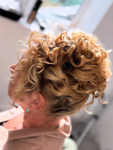 Elegant Blonde Curly Updo for Events