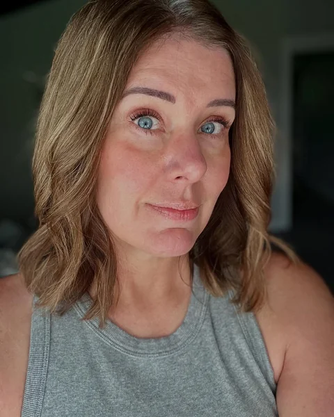 Face-Framing Bronde Lob with Soft Waves and Volume