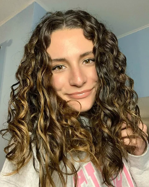 Golden Brown Curls with Sun-Kissed Dimension
