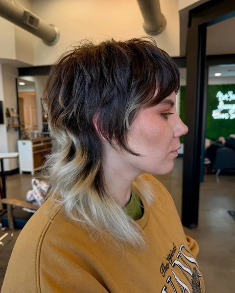 High-Contrast Mullet Shag with Blonde Tail