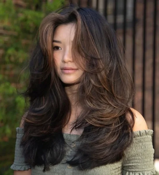 High-Volume Butterfly Layers for Thick Wavy Hair