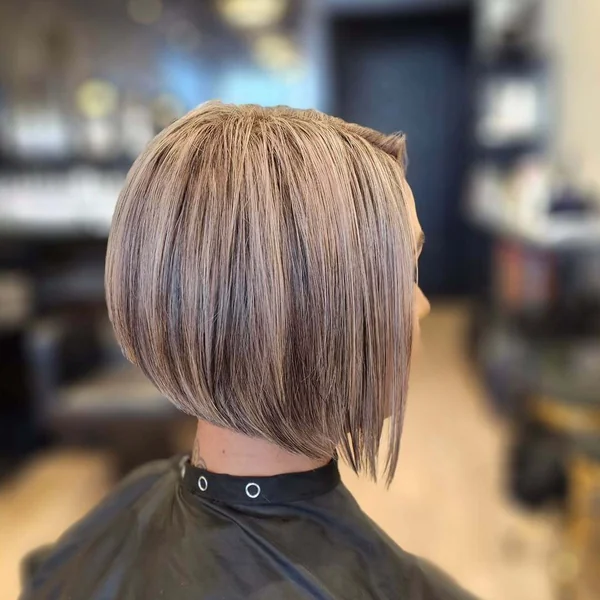 Highly Angled Bob with Stacked Nape and Blonde Tones