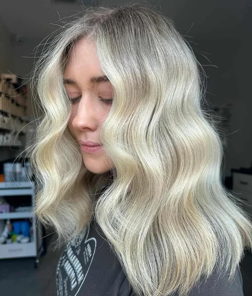 Icy Blonde Glam Waves with Soft Shine
