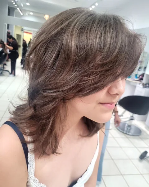 Layered Brunette Shag with Tousled Fringe