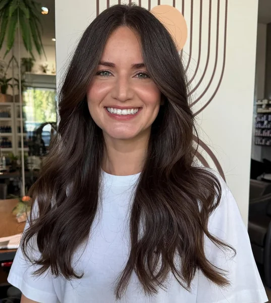 Long Dark Hair with Minimal Face-Framing Waves