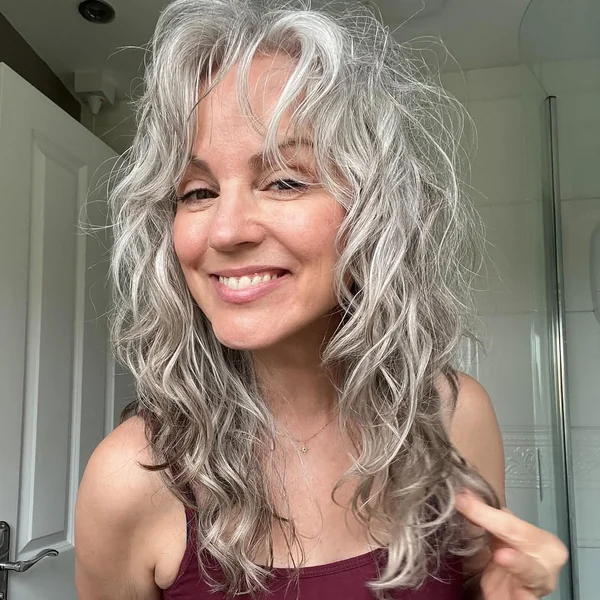Long Layered Silver Waves with Soft Natural Curls