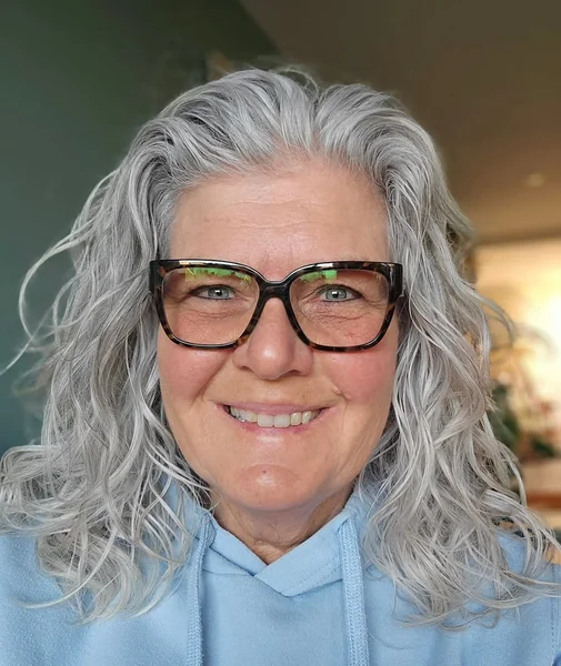 Long Silver Waves for Stylish Mature Curls