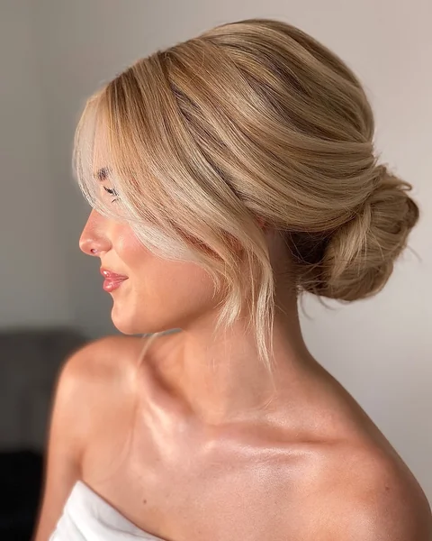 Low Textured Bun wedding hairstyle