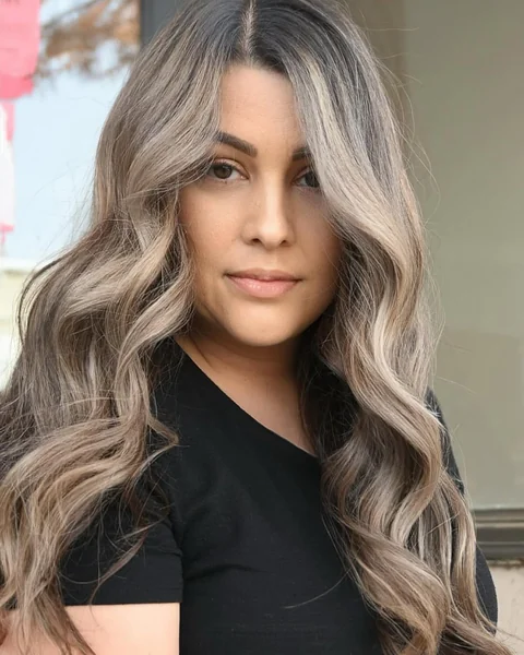 Luxurious Ash Blonde Waves with Dark Root Melt