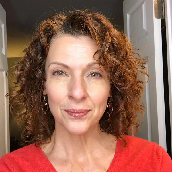 Mid-Length Auburn Bob with Bouncy Spiral Curls