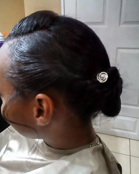 Polished Low Bun with Sleek Side-Parted Updo
