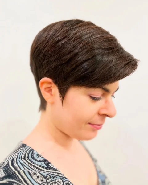 Sleek Dark Brown Pixie with Defined Side Sweep