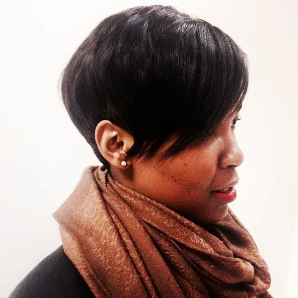 Sleek Tapered Pixie with Dramatic Side-Swept Bang