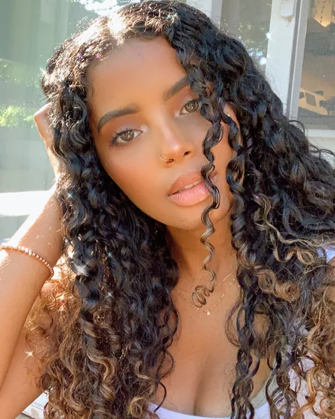 Sun-Kissed Long Spiral Curls with Auburn Ends