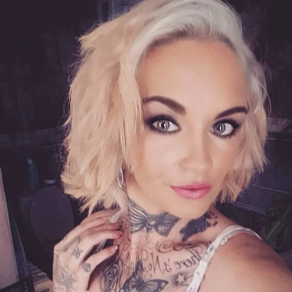 Swept-Back Platinum Bob with Voluminous Waves