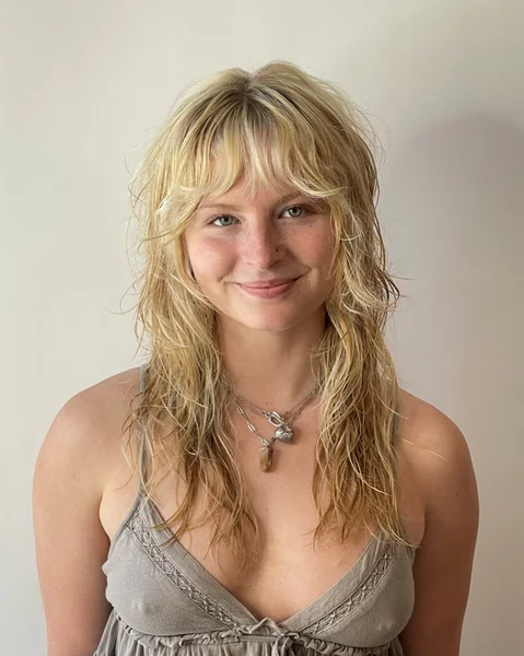 Textured Blonde Wolf Cut with Shaggy Layers