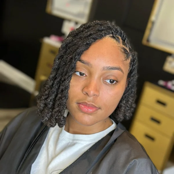 Textured Loc Bob with Side Part and Laid Edges