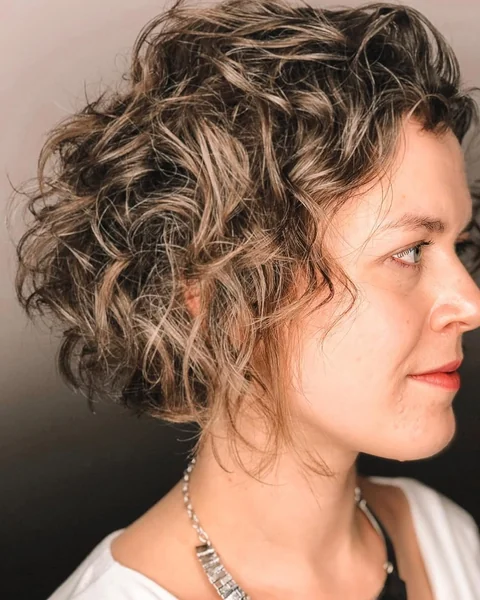 Textured Short Curly Bob with Sun-Kissed Highlights