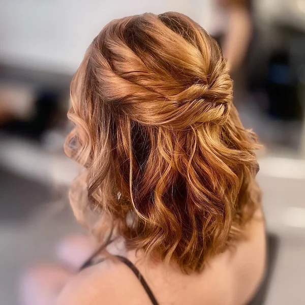 Twisted Half-Up Style for Medium Waves