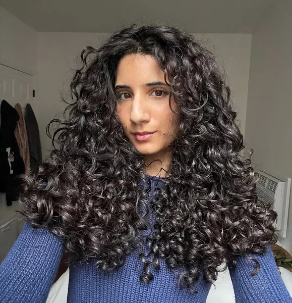 Ultra-Voluminous Dark Defined Long Spiral Curls