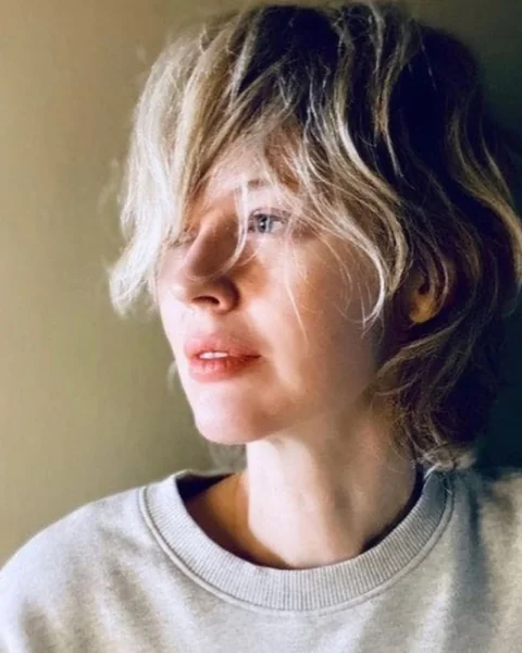 Undone Blonde Shaggy Pixie with Side Sweep