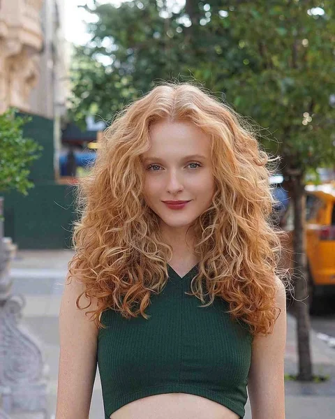 Voluminous Copper Curls on Medium Length Hair