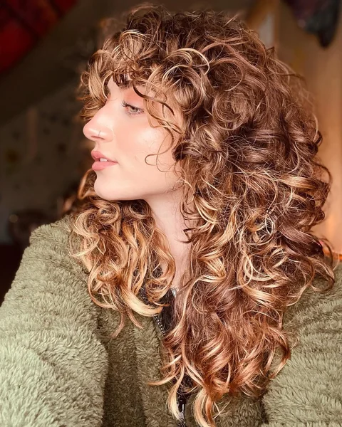 Voluminous Curly Long Shag with Face-Framing Fringe