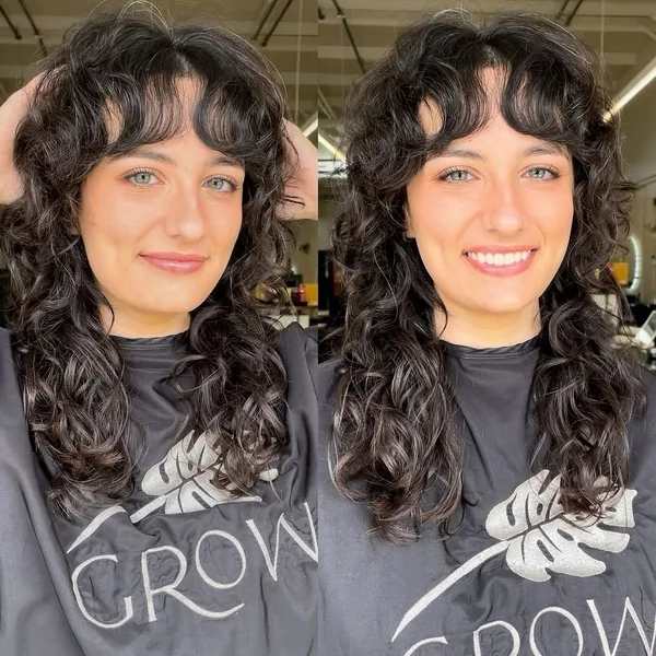 Voluminous Curly Shag with Eye-Skimming Bangs