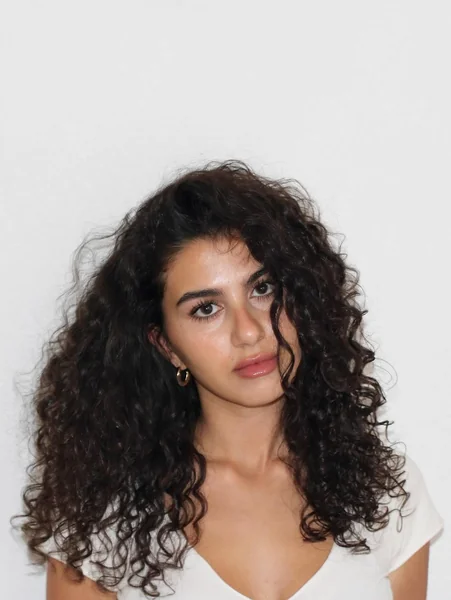 Voluminous Dark Brunette Ringlets with Natural Texture