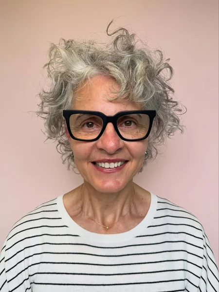 Voluminous Gray Curly Shag with Soft Layers