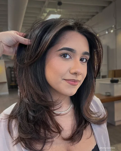 Voluminous Layered Blowout with Curtain Bangs