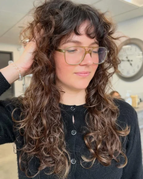 Voluminous Long Curly Shag with Bangs