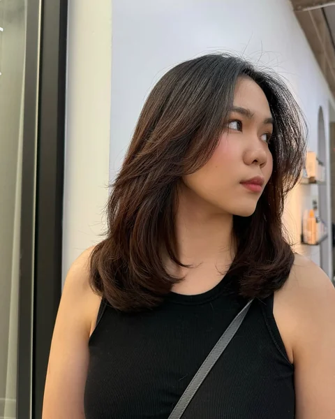 Voluminous Medium Length Layered Cut
