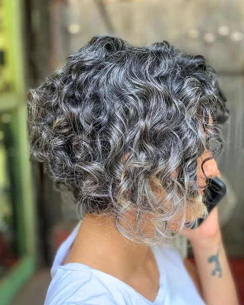Voluminous Salt & Pepper Curly Bob with Layers