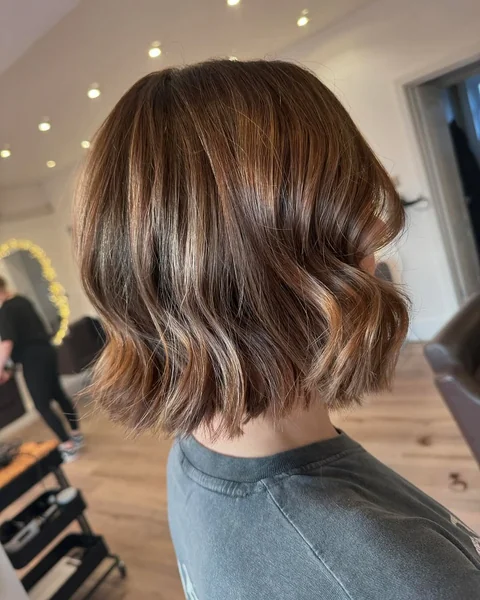 Warm Auburn Wavy Bob with Caramel Ribbons