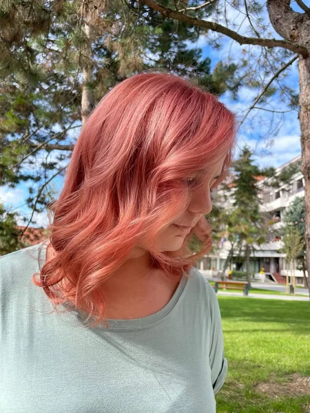 Wavy Rosy Pink Shoulder Length Layered Cut