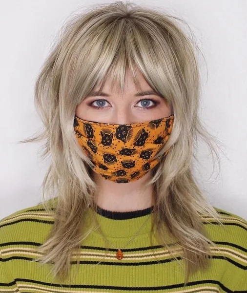 Airy Honey-Blonde Bob with Wispy Lash-Grazing Fringe