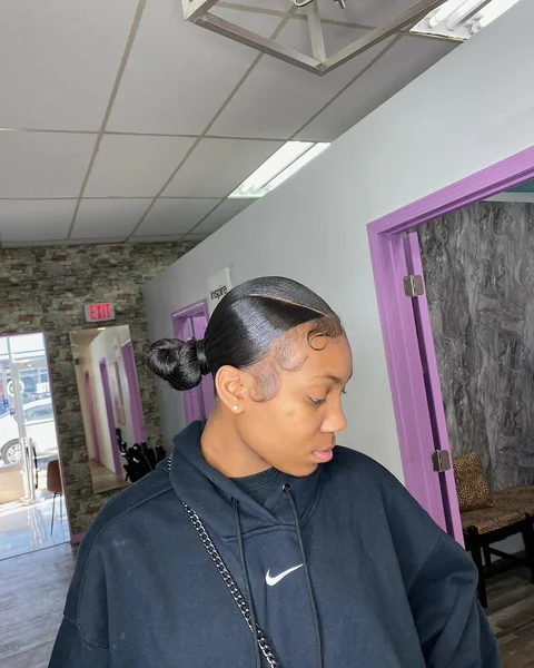 Architectural Braided Bun with Geometric Parting