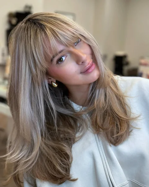 Ash Blonde Butterfly Cut with Breezy Curtain Bangs