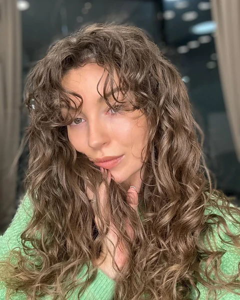 Beachy Bronde Ringlets with Curly Bottleneck Bangs