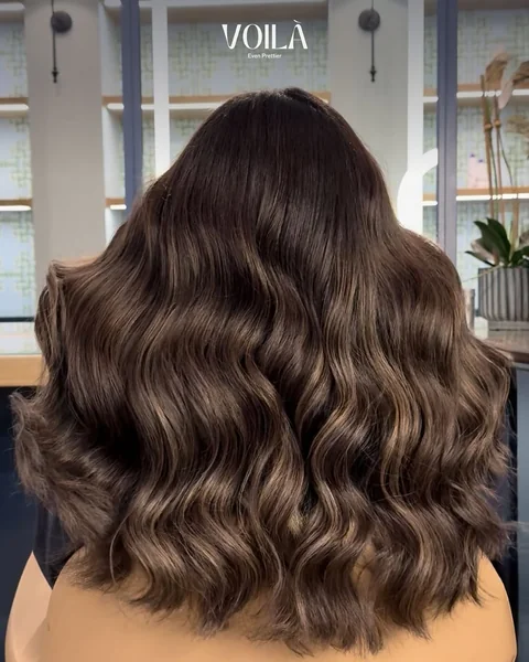 Bouncy Rich Brown Lob with Voluminous Barrel Waves