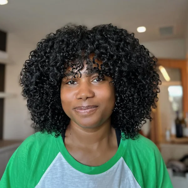 Bouncy Natural Curls with Soft Tapered Bangs