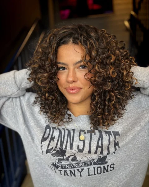 Caramel Ribboned Curly Shag with Voluminous Layers