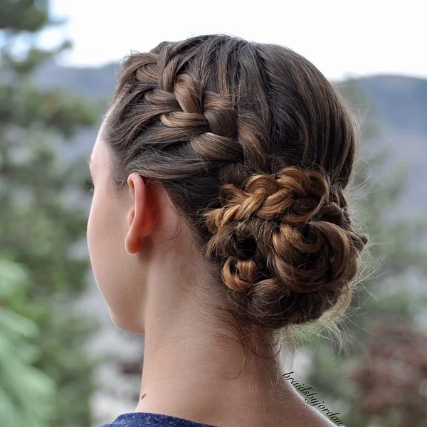 Chic Braided Low Bun with Sun-Kissed Highlights